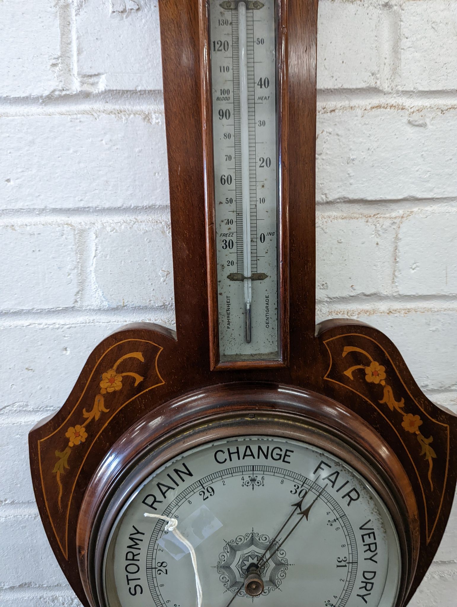 A Victorian marquetry inlaid mahogany aneroid barometer / thermometer, height 82cm